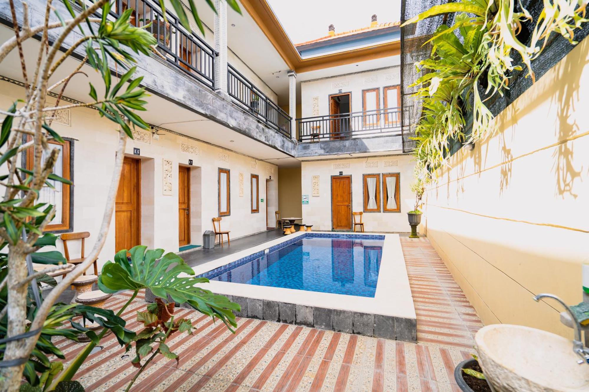 Guesthouse Cempaka Putih Seminyak Buitenkant foto
